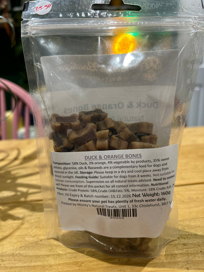 close up of ingredients of Betty's Boutique  duck and orange dog treats