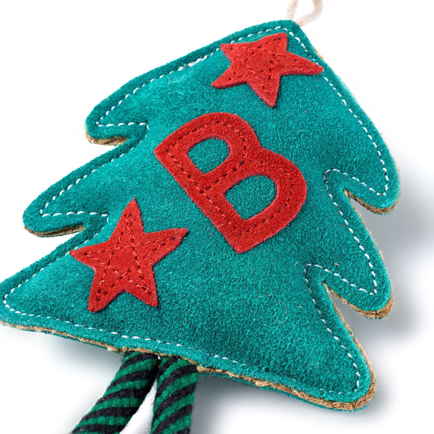 Suede Christmas tree doig toy with red letter 'B' and stars on a white background