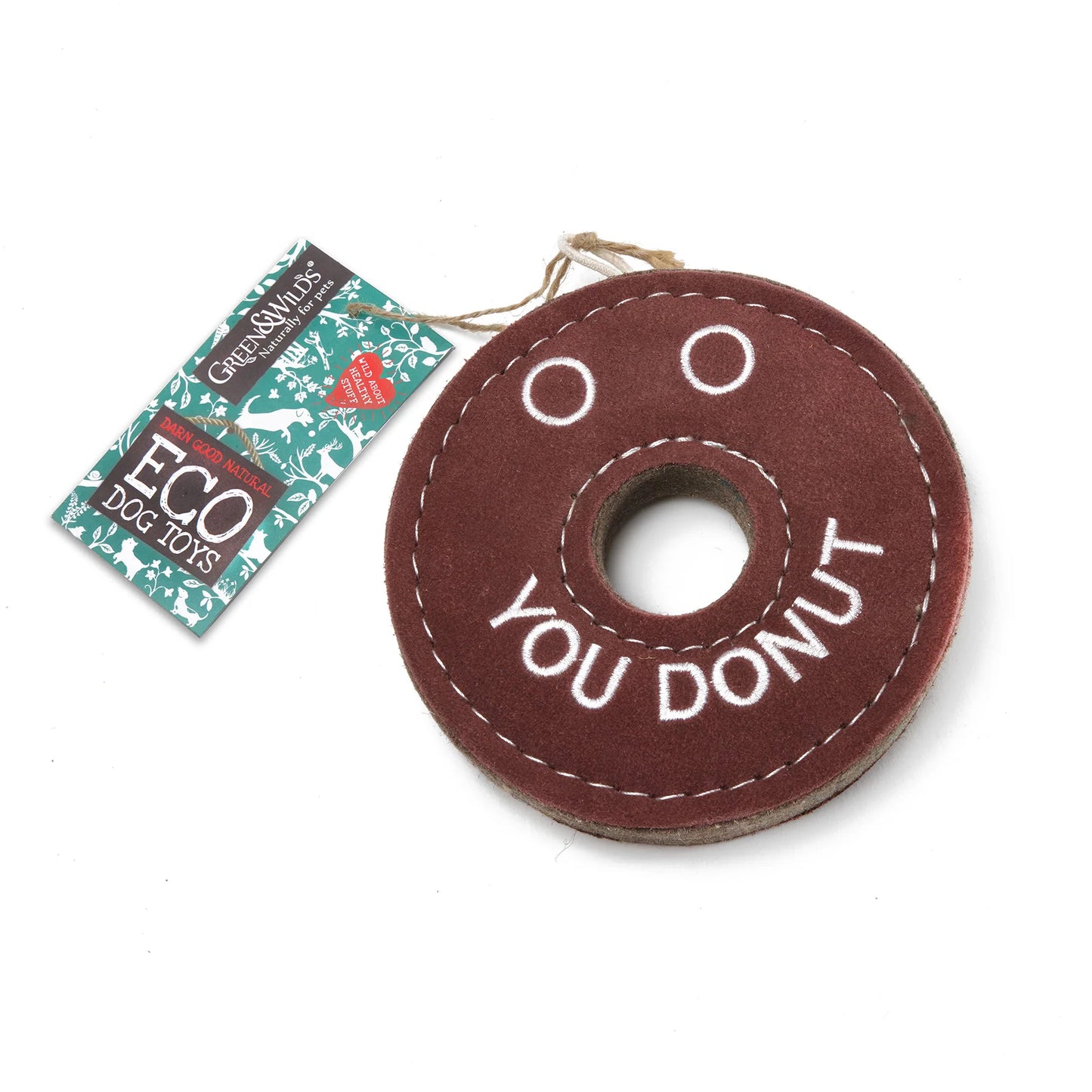 Brown donut-shaped dog toy with 'You Donut' text and a Green & Wilds tag on a white background