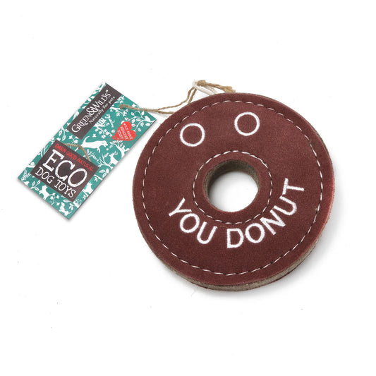 Brown donut-shaped dog toy with 'You Donut' text and a Green & Wilds tag on a white background