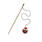 Cat toy with a string and a small round object on a white background