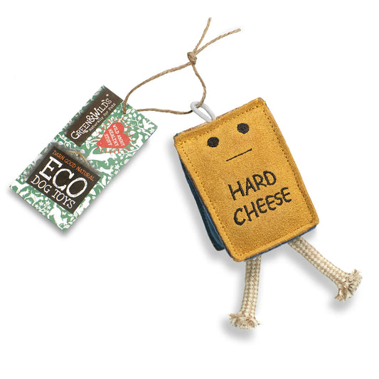 Dog toy shaped like a book labeled 'Hard Cheese' with packaging on a white background