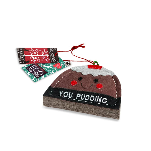 Eco friendly Christmas dog toy shaped like a pudding with a smiley face, featuring the text 'YOU PUDDING'.